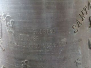 Inscripció amb el nom del padrí de la campana Santa Bàrbara” - Autor: MARTÍNEZ, J.